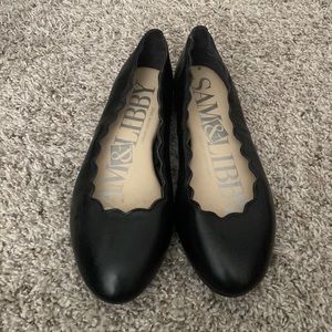 Size 7 black flats/dress shoes.